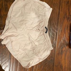 Brandy Melville light pink shorts.